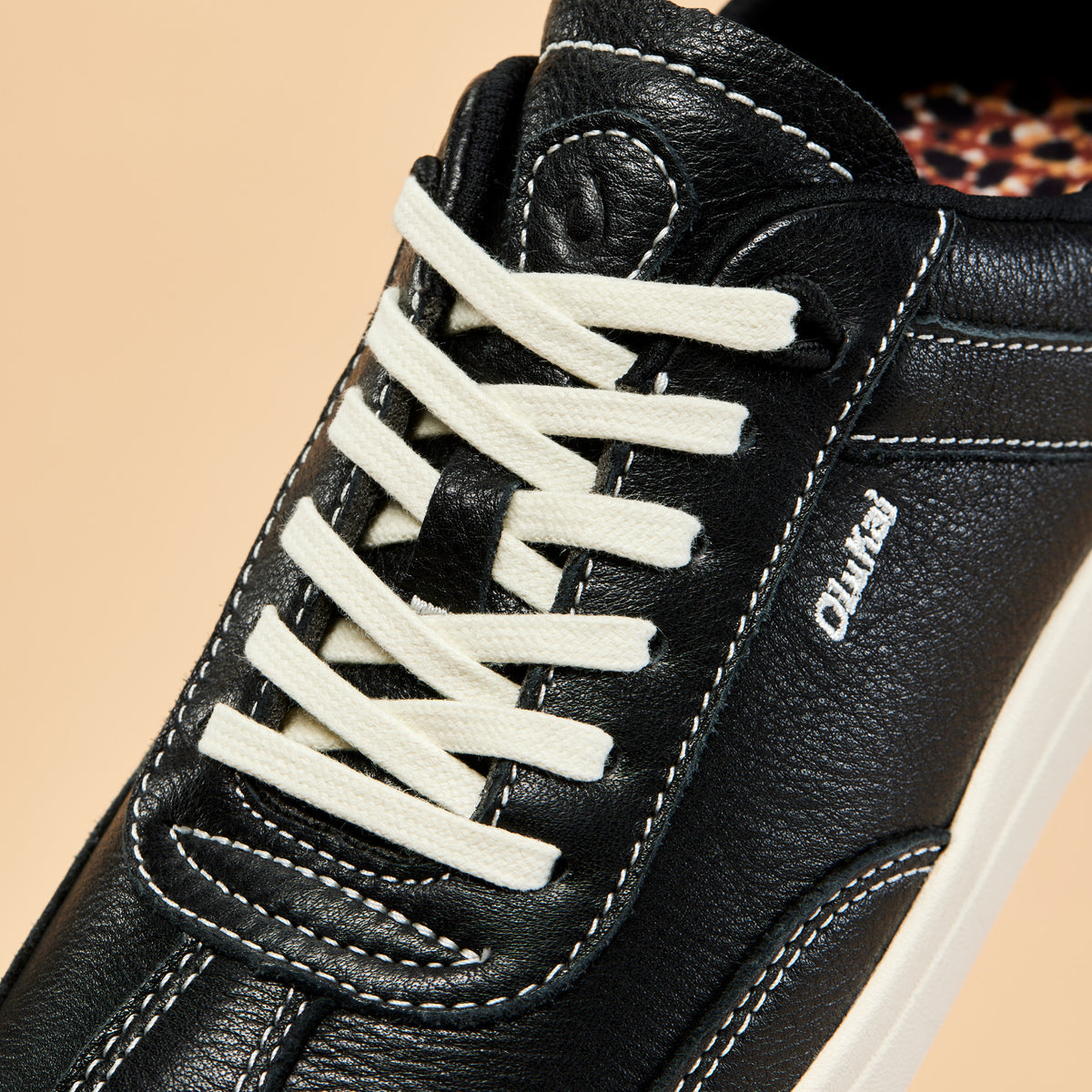 Hā‘upu Women’s Leather Sneakers - Onyx | Women OluKai for sale